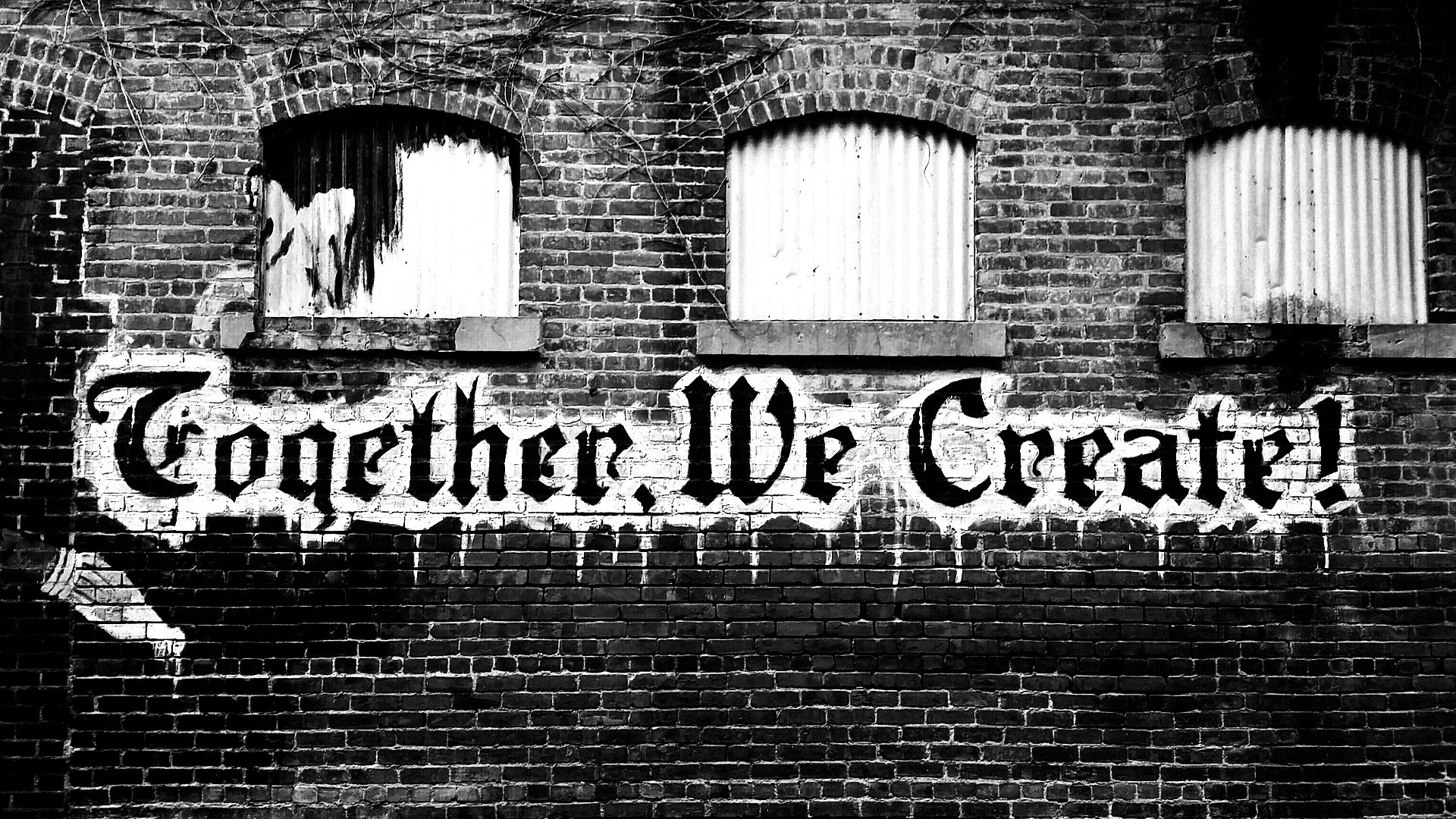 Graffity auf geklinkerter Wand Togehter we create